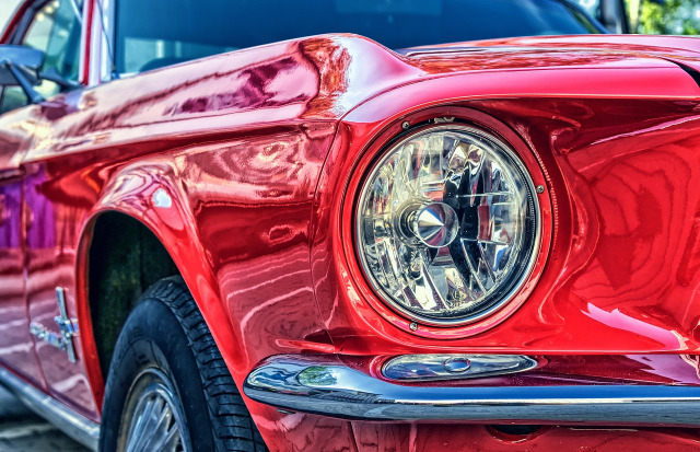 polished car headlight closeup