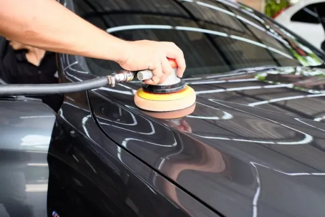 paint correction polishing black hood